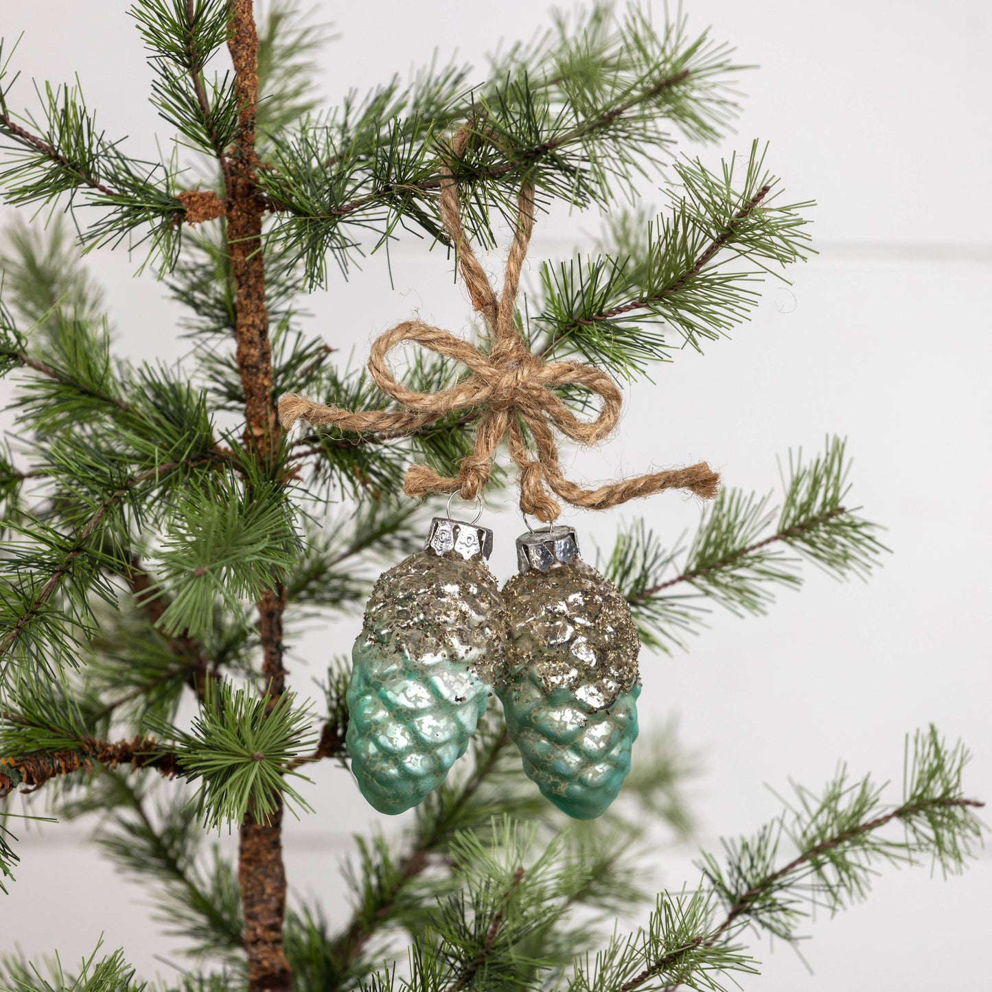 SILVER FROSTED BLUE PINECONE ORNAMENT