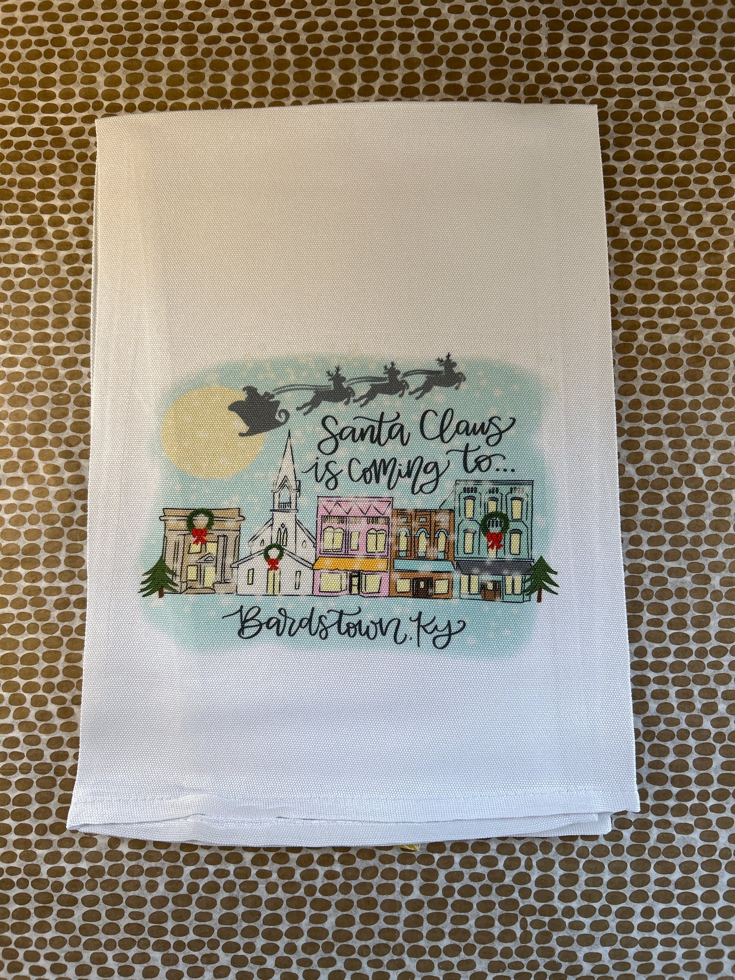 DBR Santa Clause is coming to Bardstown, Ky Tea Towel