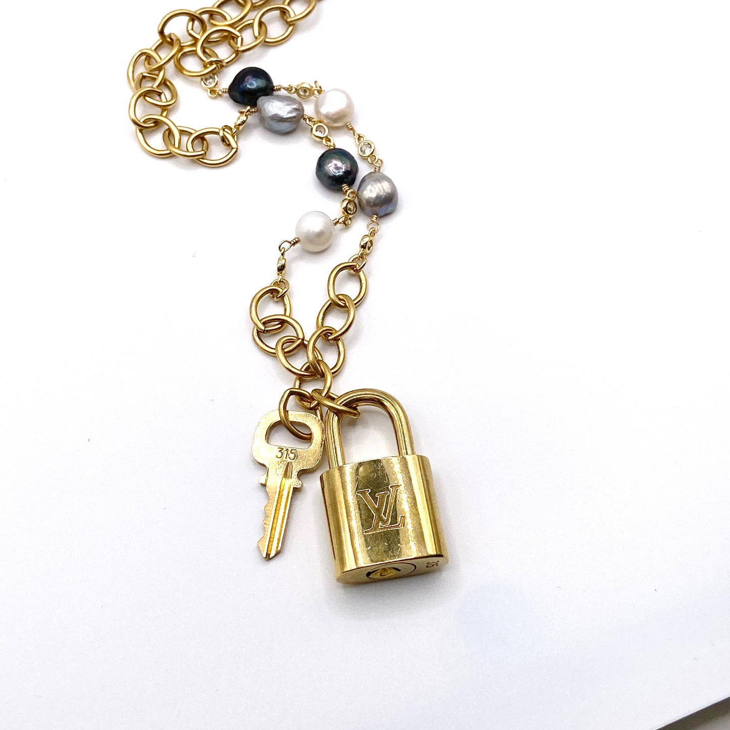 LV lock denim freshwater pearl statement necklace 